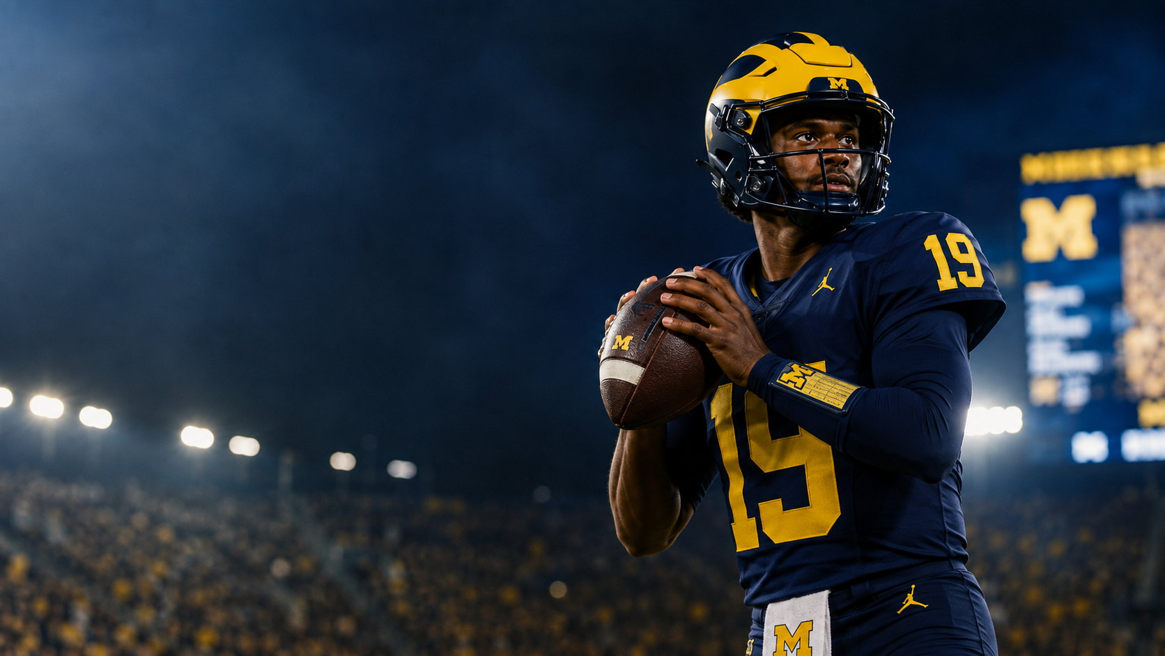 Michigan quarterback No. 19 in navy home jersey